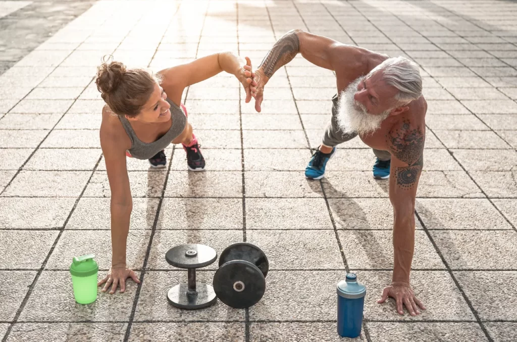 fitness couple doing push ups exercise outdoor h utc