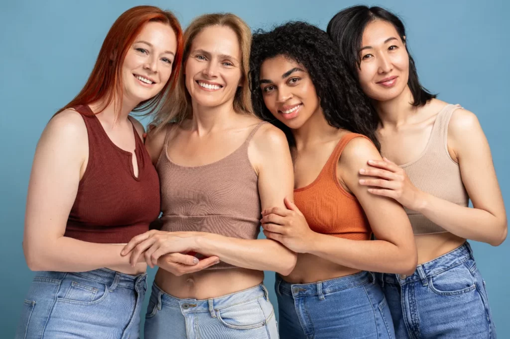 smiling women fashion models wearing stylish tops utc